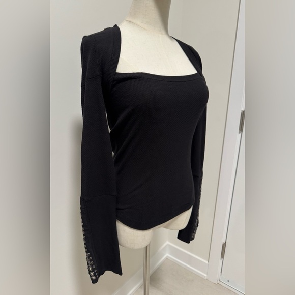 Free People - Woman’s Black top with detail on sleeves
(Listing #43) - Picture 3 of 9